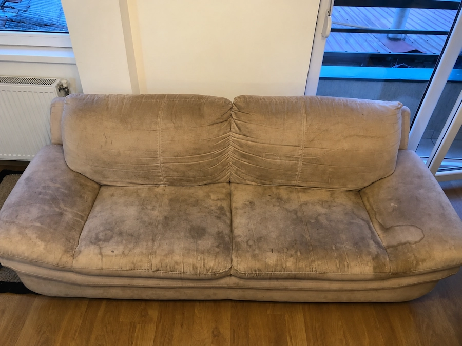 Dirty sofa before cleaning